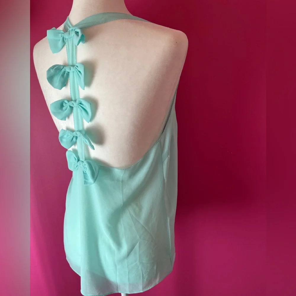 Millau bows tunic